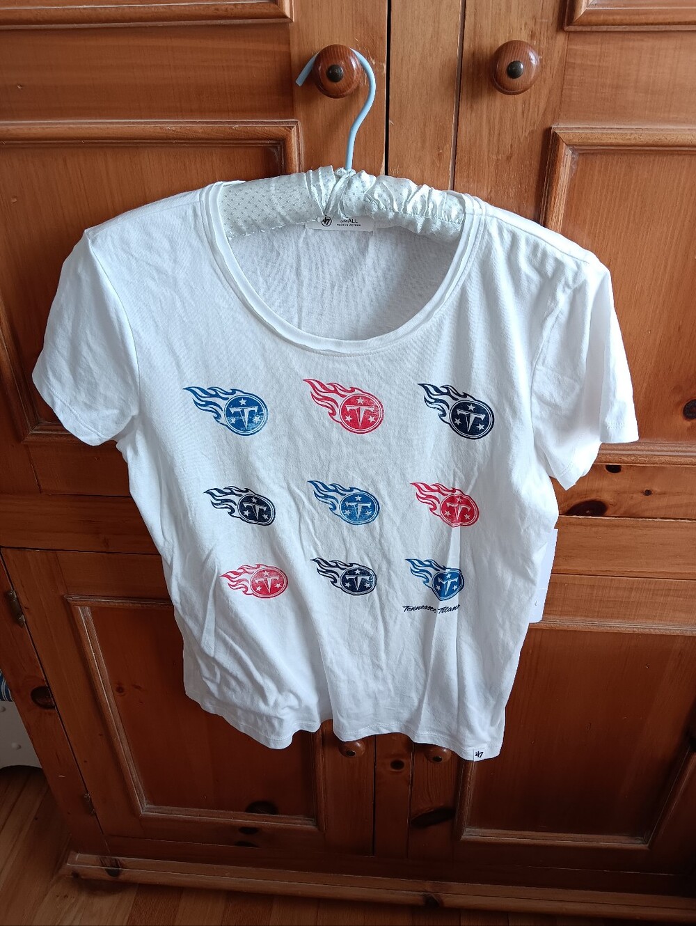 Titans 47 Brand White Short Sleeve Tee with Red, Blue & Navy Flame Logos. New